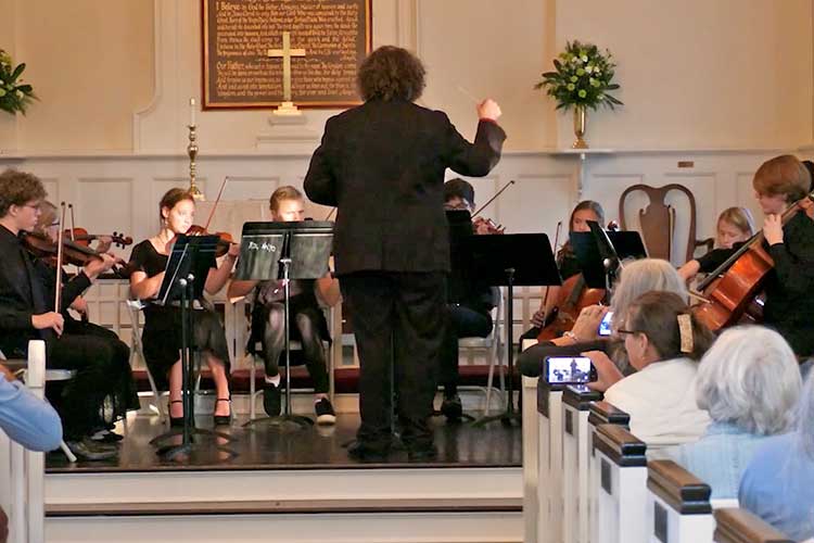 The String Orchestra for Northern Neck Youth plays the theme from “Star Wars.”